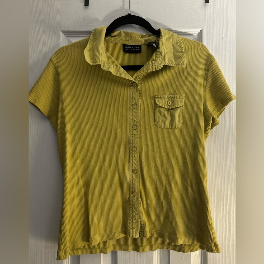 Button down polo with pocket detail